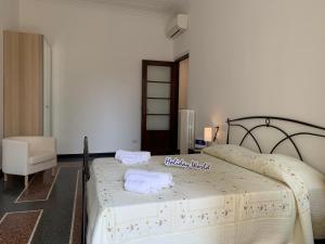 En eller flere senge i et værelse på House Acciuga innamorata by holiday world