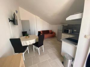 Kuchyň nebo kuchyňský kout v ubytování Apartments 'Stine'