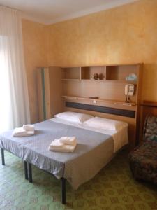 Voodi või voodid majutusasutuse Albergo Stella Di Mare toas