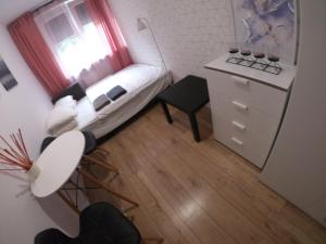 Posteľ alebo postele v izbe v ubytovaní APARTAMENT GDAŃSK ŚRÓDMIEŚCIE