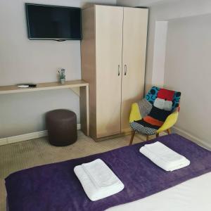 Ein Bett oder Betten in einem Zimmer der Unterkunft CASA GRINDA