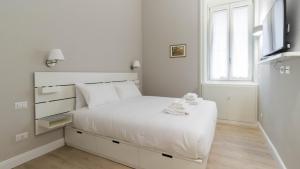 Кровать или кровати в номере Italianway - Porta Nuova 6