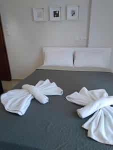 Postel nebo postele na pokoji v ubytování Little Beauty - HappyHostGr - in Platamonas