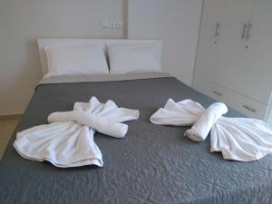 Postel nebo postele na pokoji v ubytování Little Beauty - HappyHostGr - in Platamonas