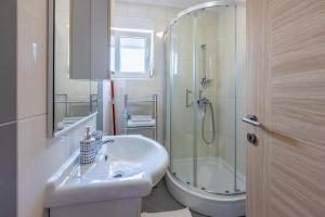 Koupelna v ubytování Apartments Rogić