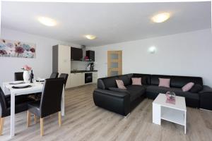 Posezení v ubytování Apartments Rogić