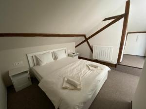 Boutique Rooms with Parking客房内的一张或多张床位