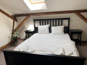 Boutique Rooms with Parking客房内的一张或多张床位