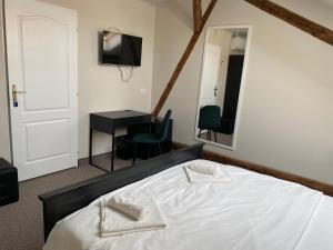 Boutique Rooms with Parking客房内的一张或多张床位