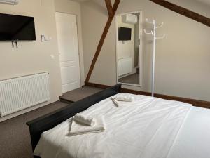 Boutique Rooms with Parking客房内的一张或多张床位