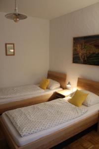 Postel nebo postele na pokoji v ubytování Hotel-Bio Gasthaus Am Felsenkeller