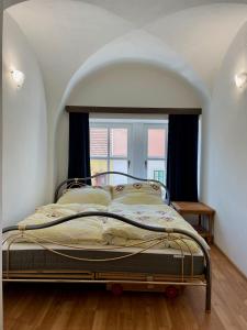 Postel nebo postele na pokoji v ubytování Bezauberndes Gästehaus in Satov
