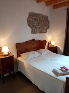 Postel nebo postele na pokoji v ubytování B&B La Corte del Segrino
