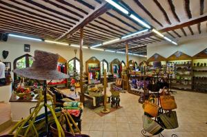 a store filled with lots of different types of bags at Bluebay Beach Resort & Spa in Kiwengwa