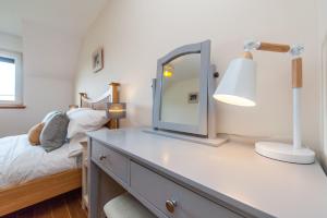 A kitchen or kitchenette at Lazy Puffin