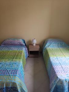 Ένα ή περισσότερα κρεβάτια σε δωμάτιο στο Casa Glorioso