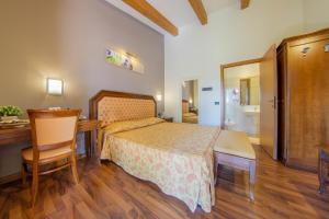 Posteľ alebo postele v izbe v ubytovaní Hotel Regio