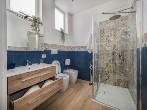Kúpeľňa v ubytovaní Azzurro Park Suite - De Vivo Realty Sorrento + 37 fotografií