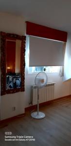 TV a/nebo společenská místnost v ubytování Tomillaron House