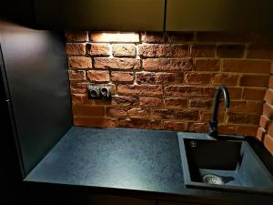 Kuchyňa alebo kuchynka v ubytovaní Spa Bath Apartment