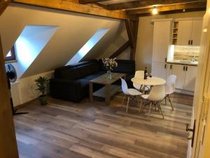 Kuchyň nebo kuchyňský kout v ubytování Egrensis Apartments