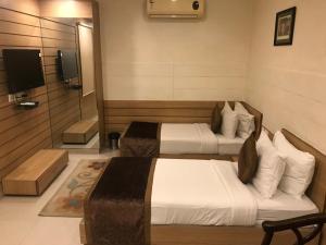 Cama o camas de una habitación en Hotel City Square