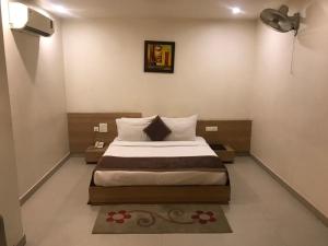 Cama o camas de una habitación en Hotel City Square