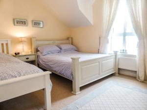 Letto o letti in una camera di Beach View