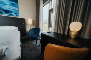 Postel nebo postele na pokoji v ubytování Comfort Hotel Bodø