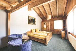 Posezení v ubytování Hotel Alpina