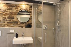 Ένα μπάνιο στο Ferienapartment Rebwinkel
