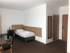 Postel nebo postele na pokoji v ubytování Motel R10