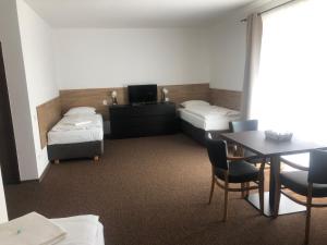 Postel nebo postele na pokoji v ubytování Motel R10