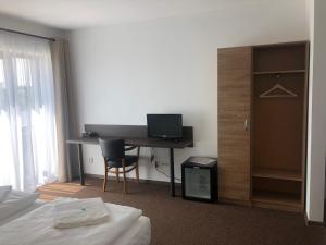 TV a/nebo společenská místnost v ubytování Motel R10