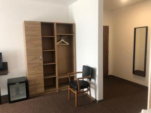 TV a/nebo společenská místnost v ubytování Motel R10