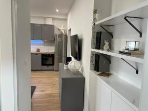 Kuchyň nebo kuchyňský kout v ubytování Apartment in city center 2