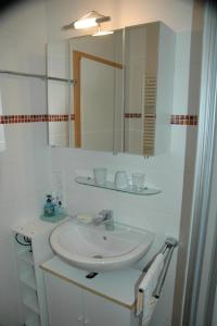 Kylpyhuone majoituspaikassa Ferienwohnung Schewe