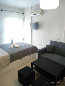 TV a/nebo společenská místnost v ubytování Little Beauty - HappyHostGr - in Platamonas