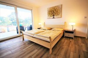 Postel nebo postele na pokoji v ubytování New Villa with Pool + 32 fotografií