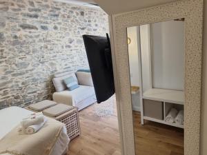 Coin salon dans l'établissement Osemae Immobilier - Redon Port-Chatelêt