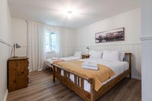 Ένα ή περισσότερα κρεβάτια σε δωμάτιο στο Chalet Chevreuil Zen +28 φωτογραφίες