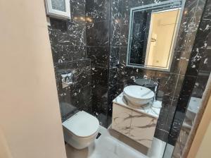 Kúpeľňa v ubytovaní Polymnia Luxury Apartments Argostoli
