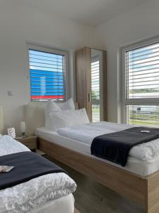 
Ein Bett oder Betten in einem Zimmer der Unterkunft TWT Motel
