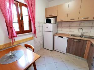 Kuchyňa alebo kuchynka v ubytovaní Villa Mira Garica by El-Pi Tours