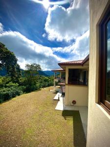 a house with a view of a yard at Inn The Coffeepot - Boutique Hotel in Boquete