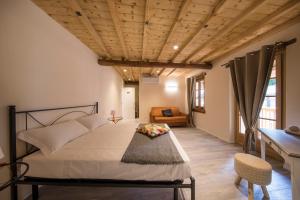 Säng eller sängar i ett rum på Corte Garibaldi