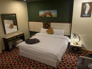 Postel nebo postele na pokoji v ubytování Omar Elkhaiam Hotel