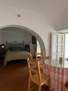 Cama ou camas em um quarto em Casa do Menino Jesus
