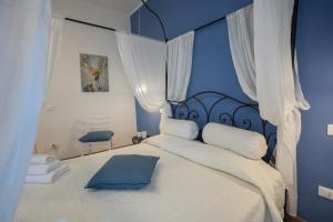Postel nebo postele na pokoji v ubytování EXCLUSIVE ROOMS Al Vicoletto