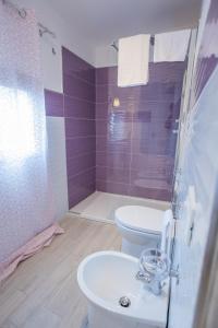 Koupelna v ubytování EXCLUSIVE ROOMS Al Vicoletto